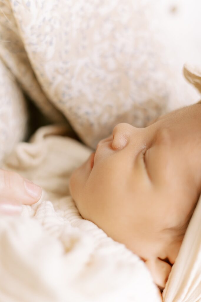 in home newborn photos baby with mom and dad