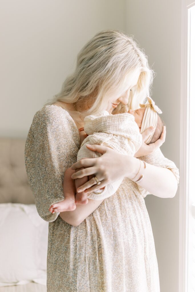 in home newborn photos baby with mom and dad