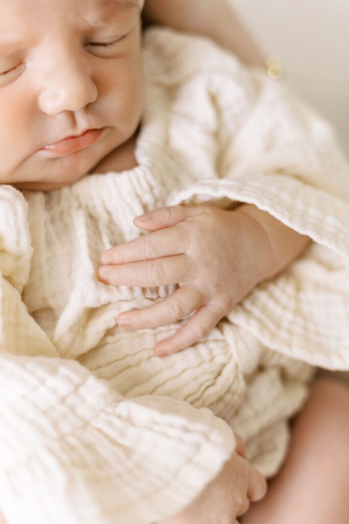 in home newborn photos baby with mom and dad