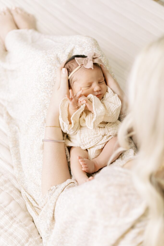 in home newborn photos baby with mom and dad