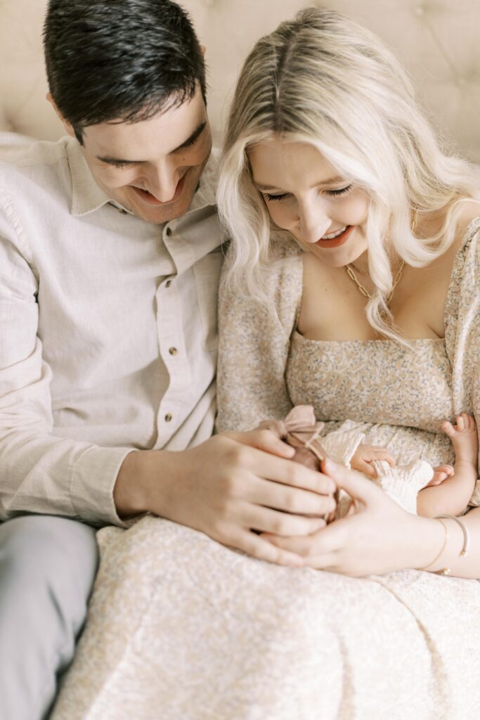 in home newborn photos baby with mom and dad