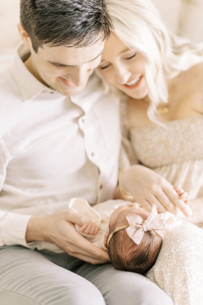 in home newborn photos baby with mom and dad