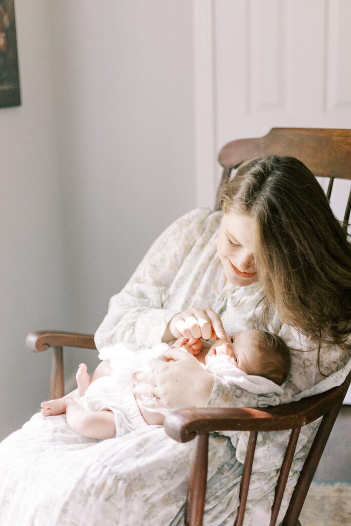 mom with baby in rocking chair