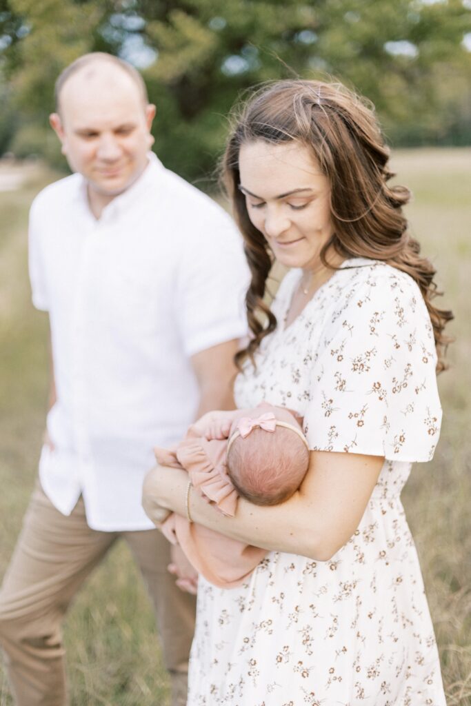 outdoor field newborn photos