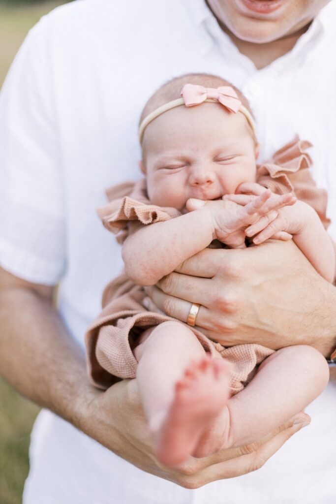 outdoor field newborn photos