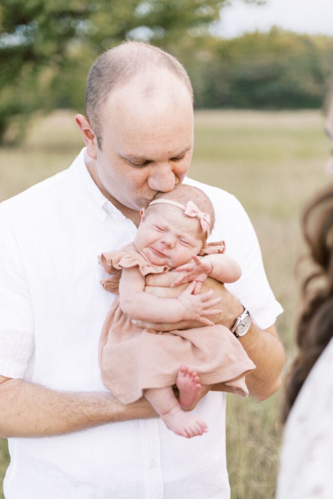 outdoor field newborn photos