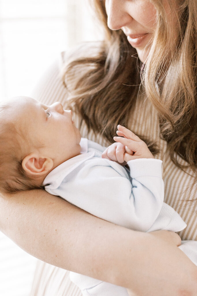 mom holding newborn baby