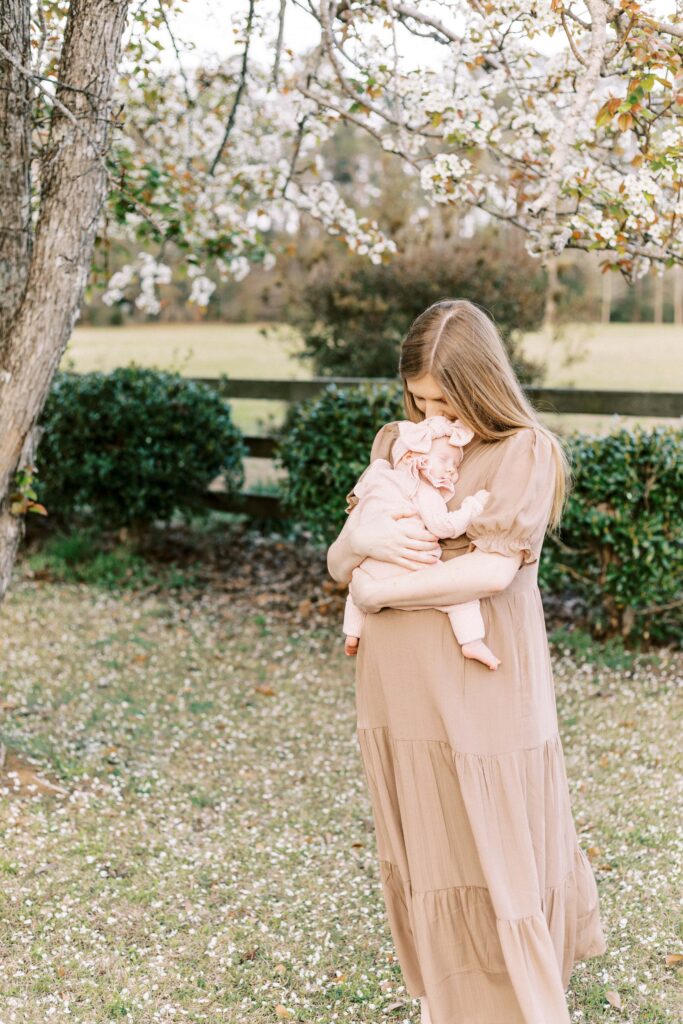mom hugging baby in central il newborn photos