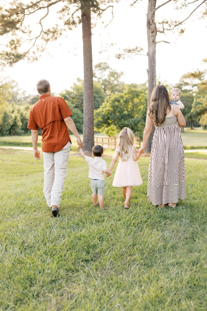 family walking away in summer photos in peoria il