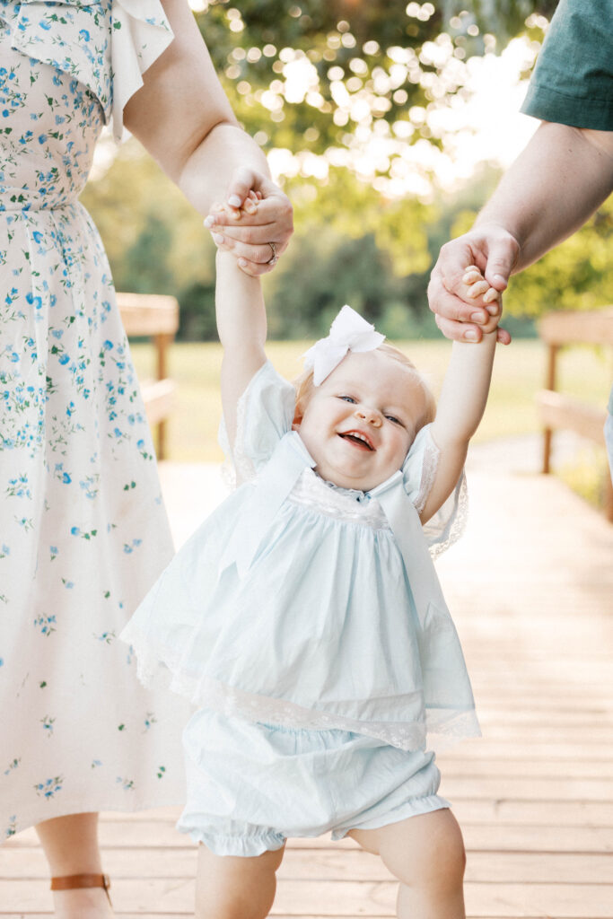 baby smiling during sunset photos