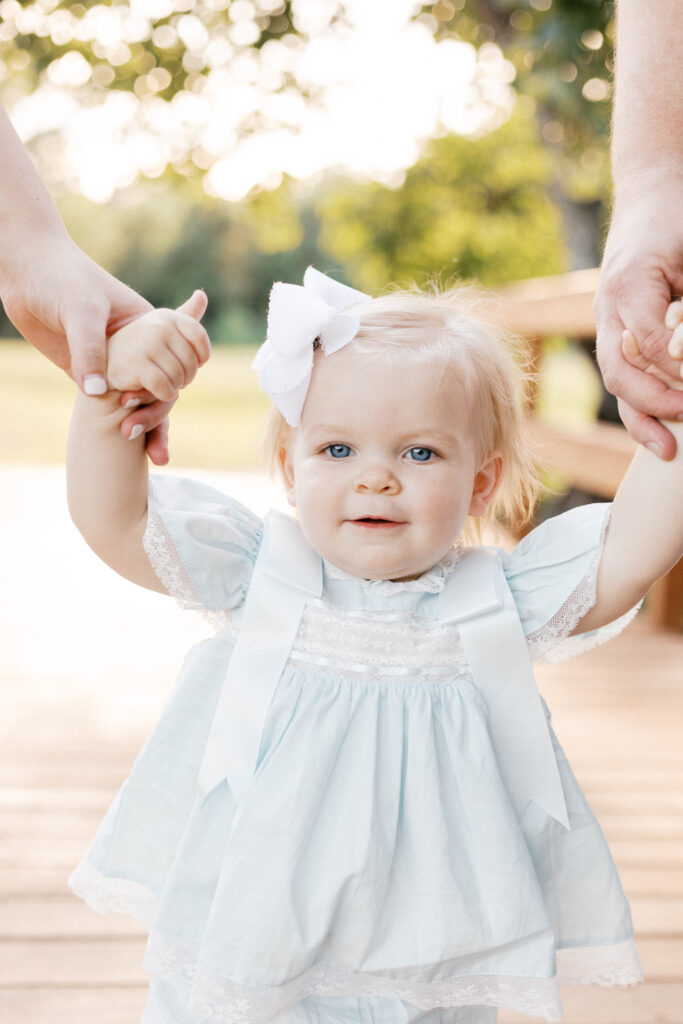 baby smiling during milestone photos