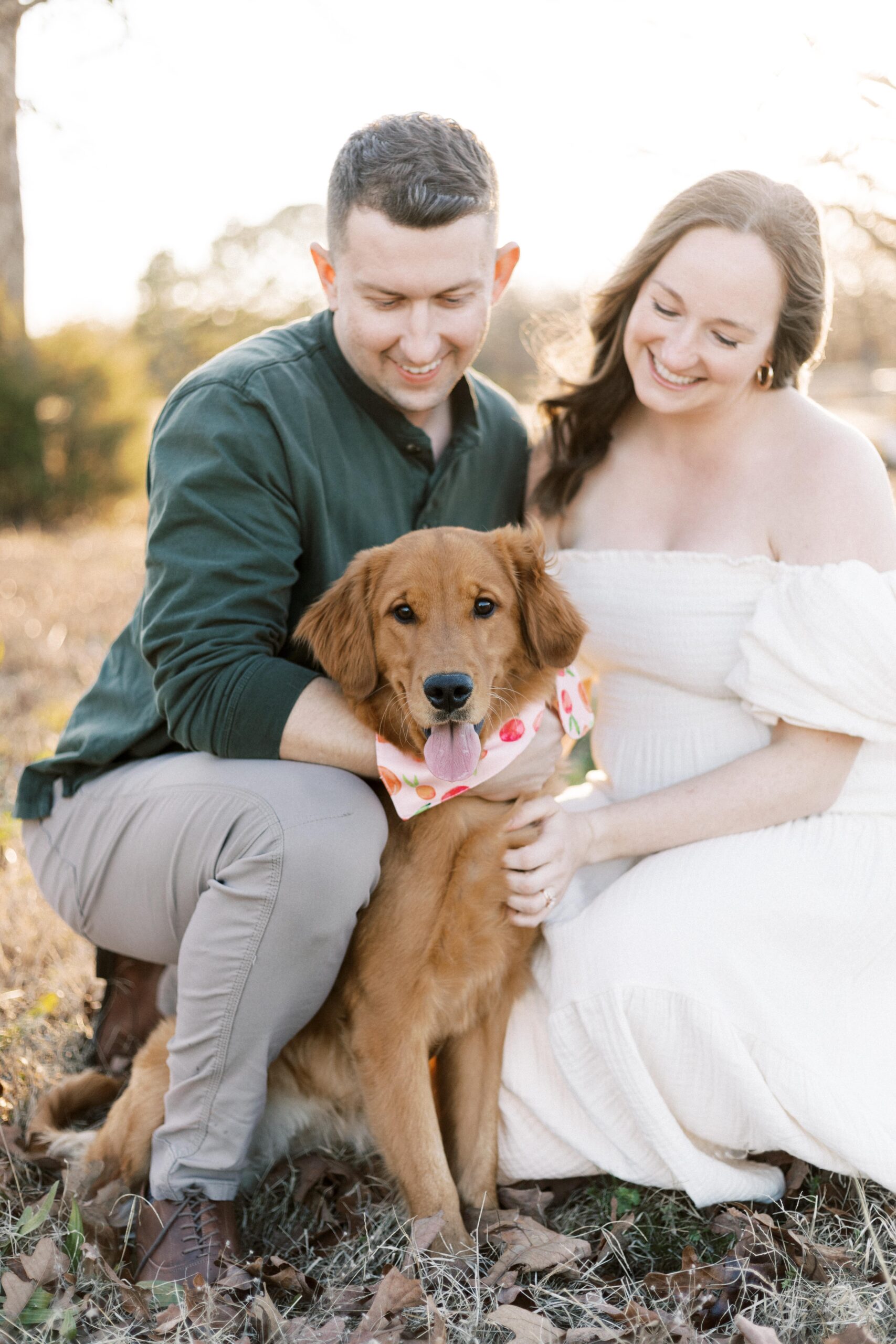 family smiling at dog in peoria il family photos