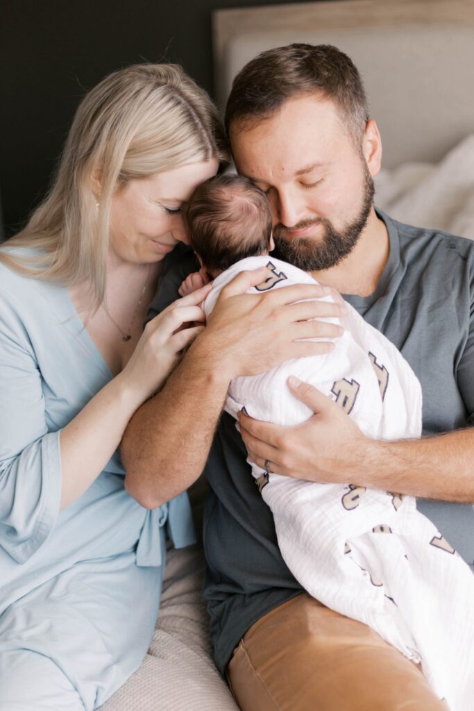 Peoria newborn photographer captures baby in nursery