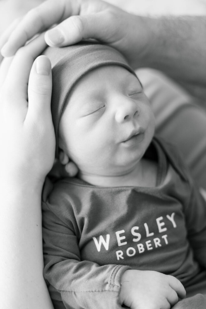 Peoria newborn photographer captures baby in nursery