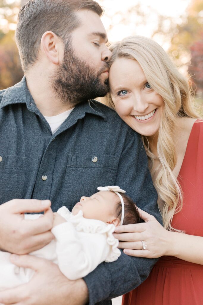 peoria illinois newborn photographer-11 copy-min parents holding baby in outdoor newborn photos peoria illinois