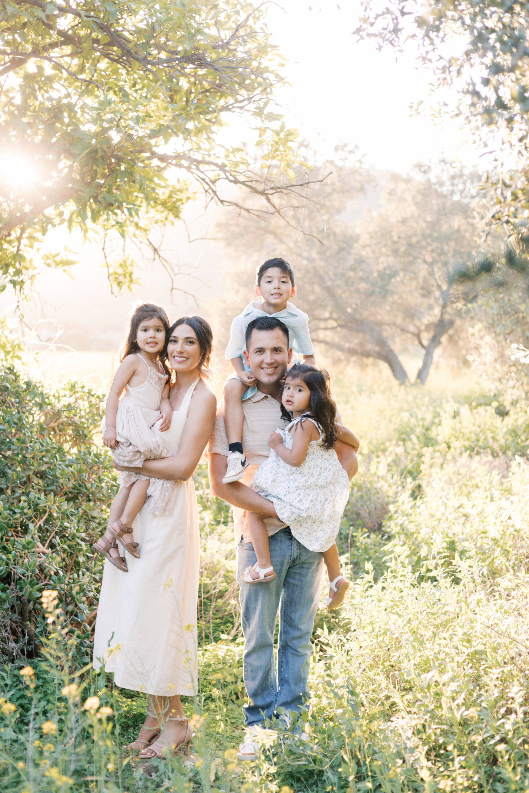 family portrait in green park in spring in peoria illinois