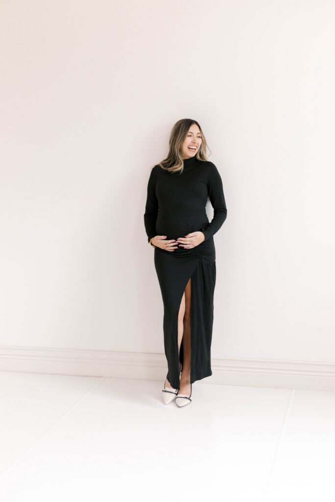 studio maternity photographer peoria il-58 mom in long maxi black turtleneck dress in studio maternity photos peoria il