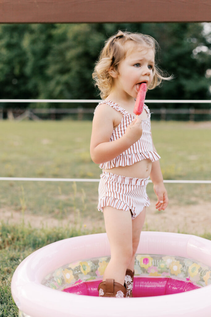 girl eating popsicle in summer family photos peoria il